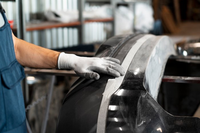 Peinture d'un élément carrosserie — aile, porte, pare-chocs